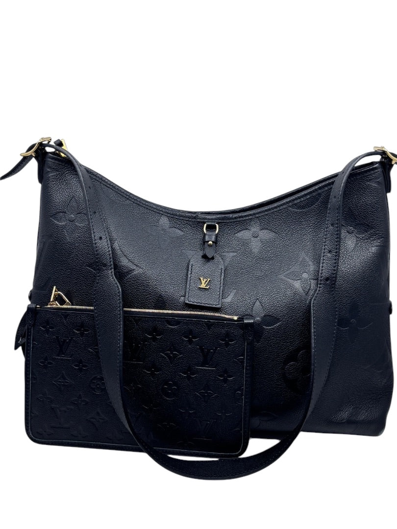 Posh Purse Co black Louis Vuitton CarryAll handbag with embossed monogram leather and matching detachable pouch