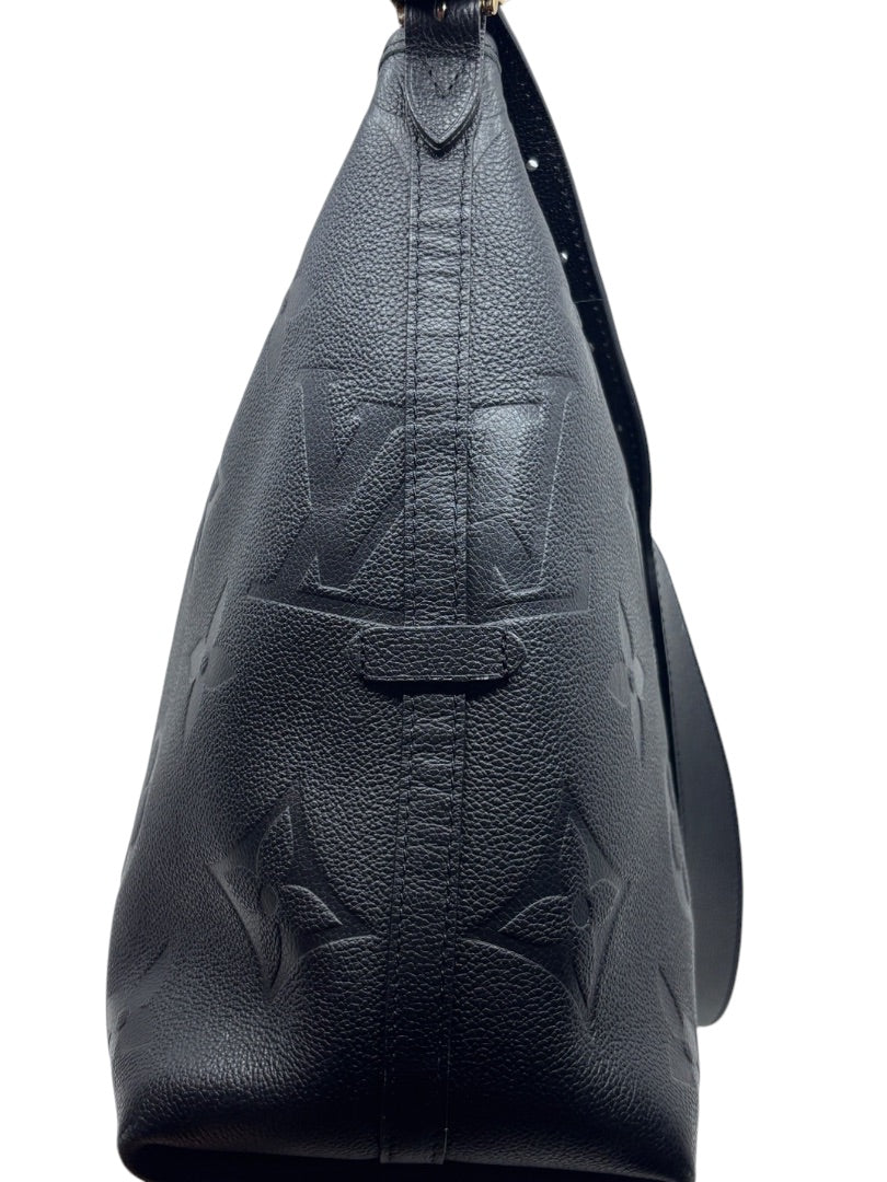 Posh Purse Co black Louis Vuitton CarryAll handbag with embossed monogram leather and side profile view