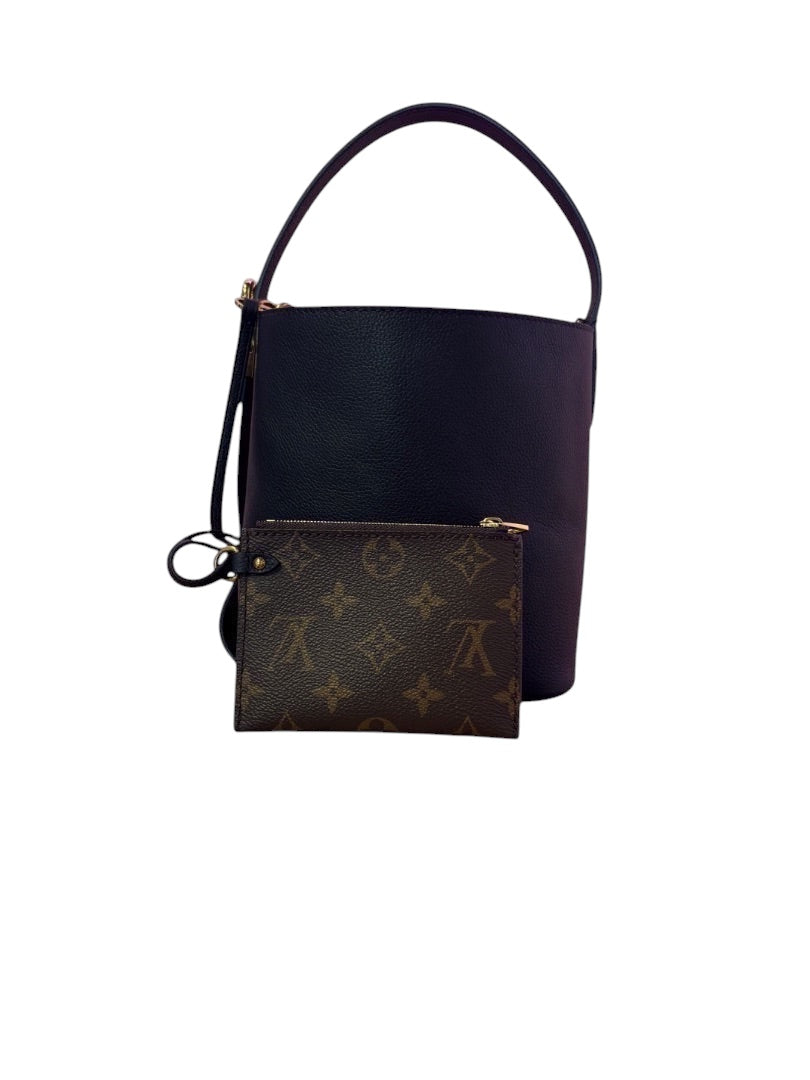 Posh Purse Co. black Louis Vuitton Lowkey Carryall bucket bag with a monogram pouch on a white background.