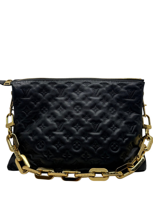 Posh Purse Co black Louis Vuitton Coussin MM bag in embossed lambskin leather with a chunky gold chain strap.