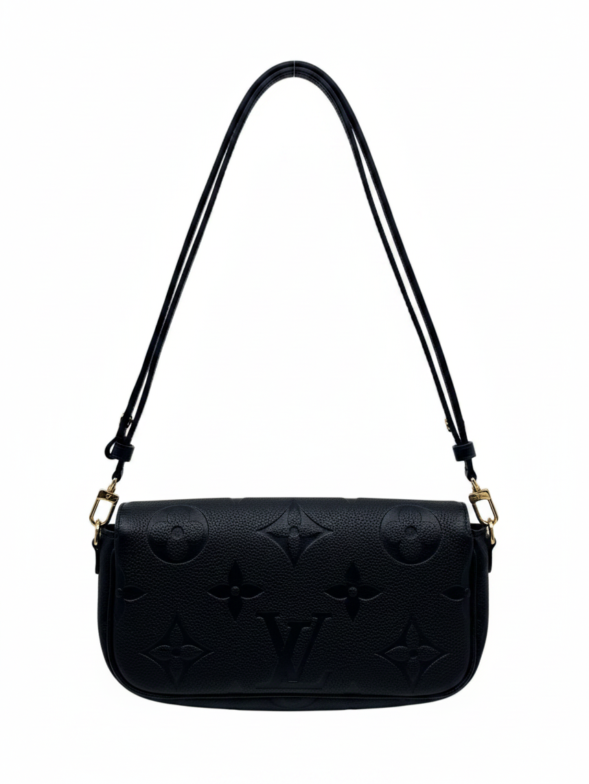 Posh Purse Co. black Louis Vuitton Ivy wallet on chain in embossed Monogram Empreinte leather with gold hardware.