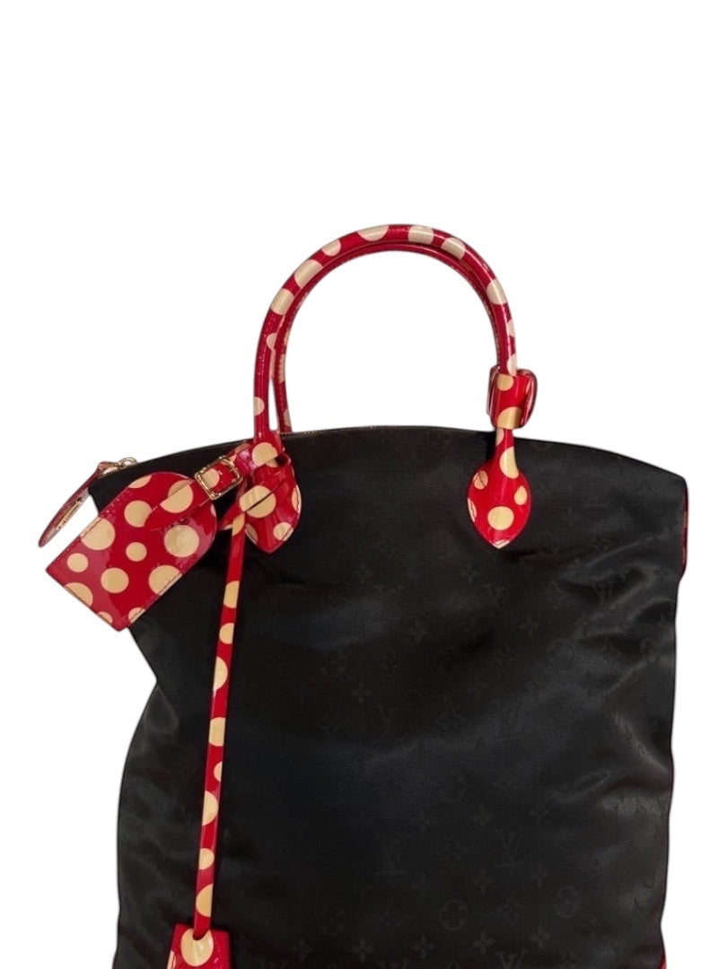 Posh Purse Co black Louis Vuitton x Yayoi Kusama Lock It tote with red and cream polka dot handles and trim.
