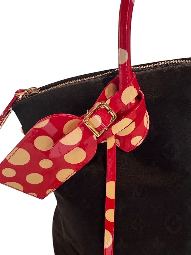 Posh Purse Co black Louis Vuitton x Yayoi Kusama Lock It tote with red and cream polka dot patent leather trim and handles.