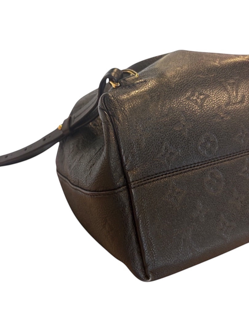 Posh Purse Co black Louis Vuitton Montsouris PM backpack in embossed Monogram Empreinte leather with gold-tone hardware.