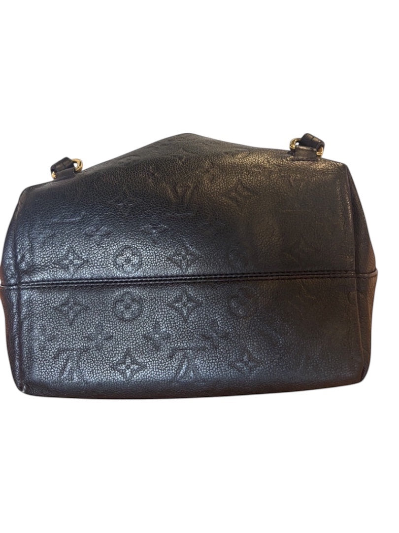 Posh Purse Co black Louis Vuitton Montsouris PM backpack in embossed Monogram Empreinte leather with gold-tone hardware.