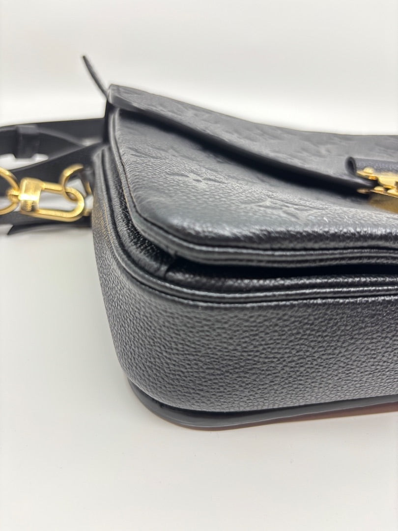 Posh Purse Co Black Louis Vuitton Empreinte Pochette Metis crossbody bag with gold hardware and embossed monogram.