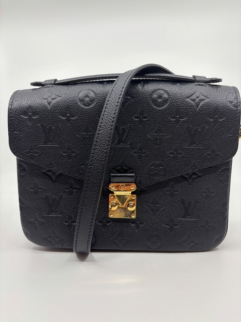 Posh Purse Co Black Louis Vuitton Empreinte Pochette Metis embossed leather crossbody bag with gold hardware and S-lock closure.