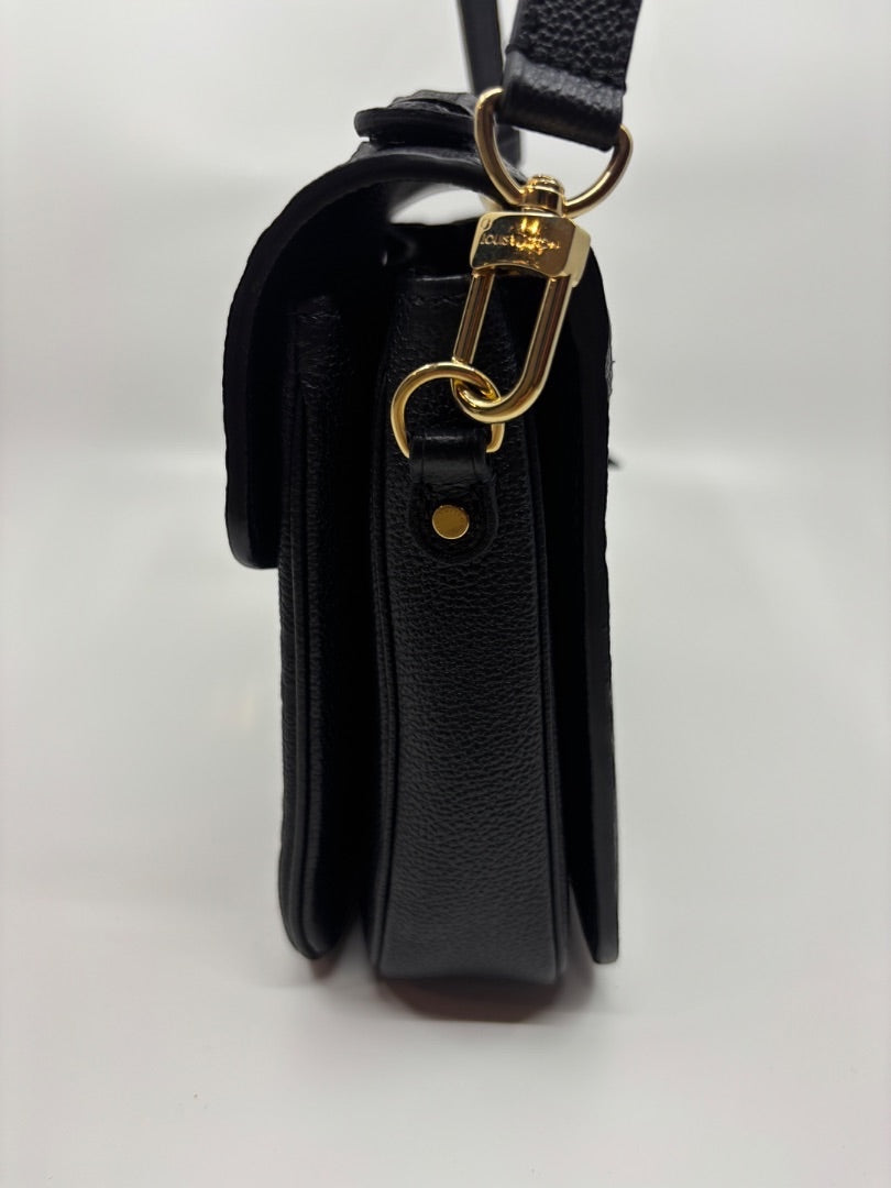 Posh Purse Co Black Louis Vuitton Empreinte Pochette Metis handbag with gold hardware and embossed monogram.