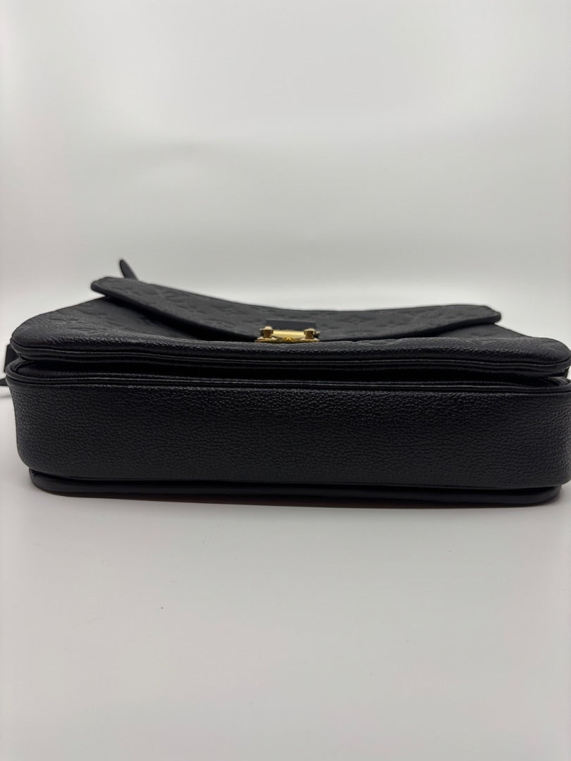 Posh Purse Co Black Louis Vuitton Empreinte Pochette Metis handbag with gold hardware and embossed monogram pattern.