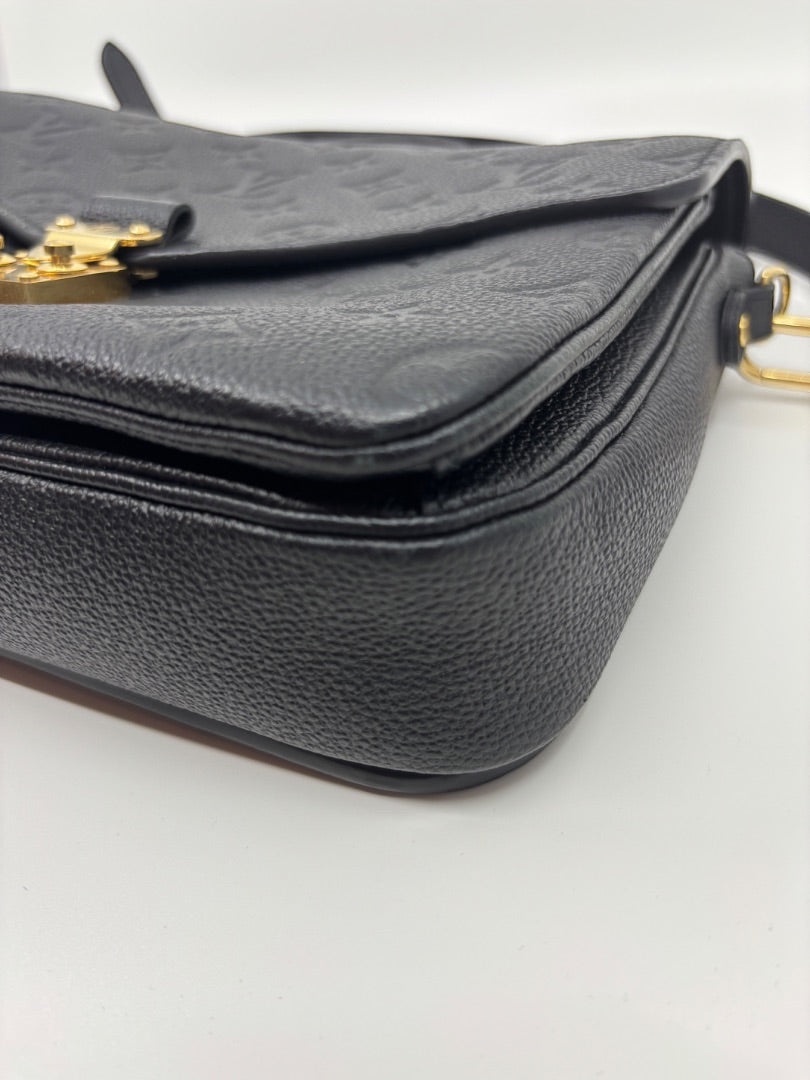 Posh Purse Co Black Louis Vuitton Empreinte Pochette Metis embossed leather crossbody bag with gold hardware.