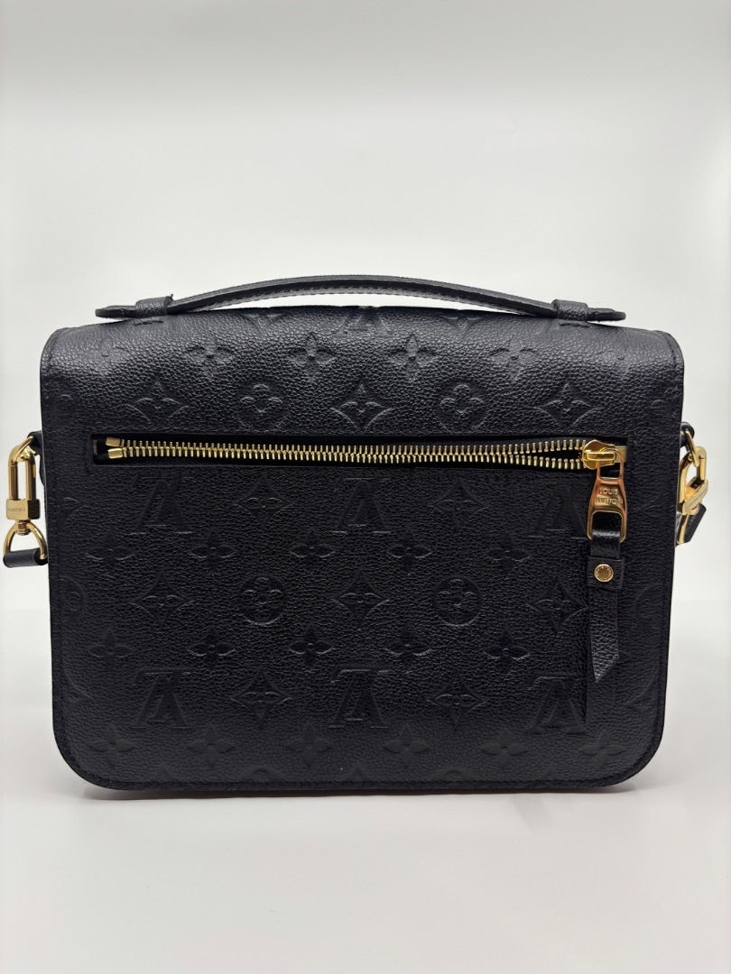 Posh Purse Co Black Louis Vuitton Empreinte Pochette Metis embossed leather crossbody bag with gold hardware.