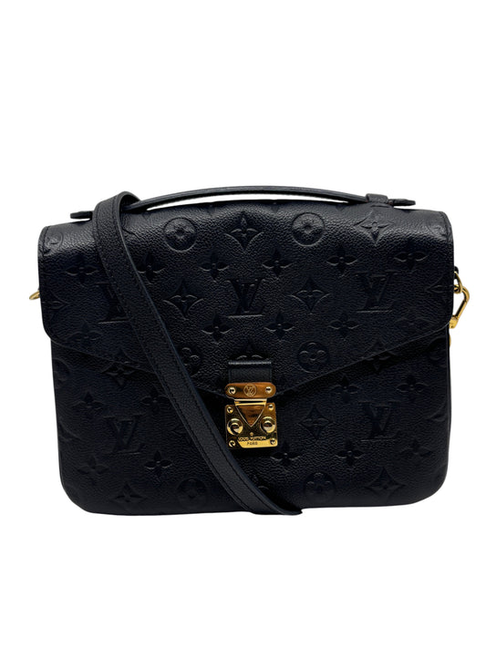 Posh Purse Co. black Louis Vuitton Empreinte Pochette Metis handbag with gold hardware and embossed monogram leather.