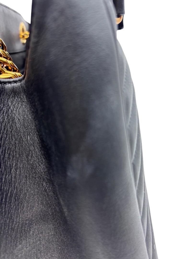 Posh Purse Co black quilted leather Louis Vuitton New Wave chain bag side view showing texture and gold hardware