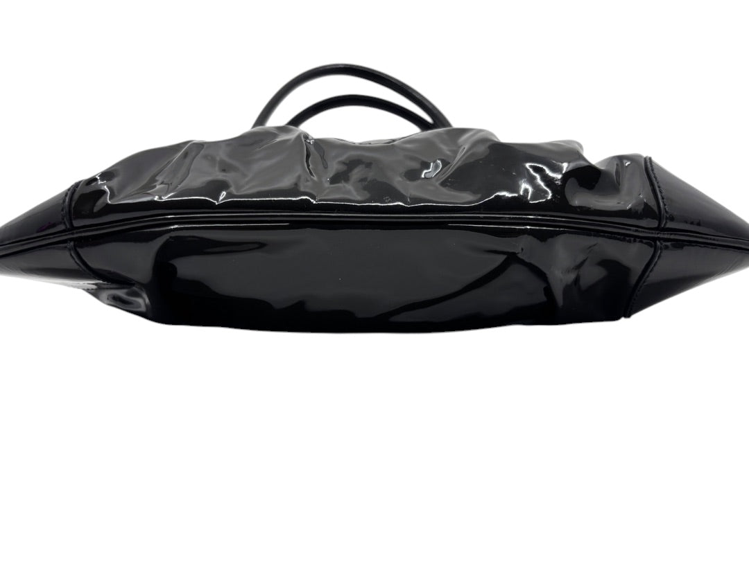 Posh Purse Co. black patent leather Ferragamo shoulder bag showing the glossy base and structured silhouette