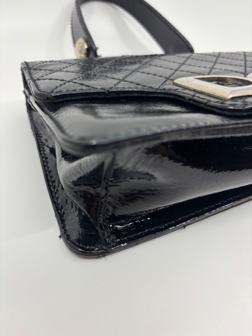 Posh Purse Co. black patent leather shoulder bag with silver D&G logo and silver hardware. Quilted flap detail.