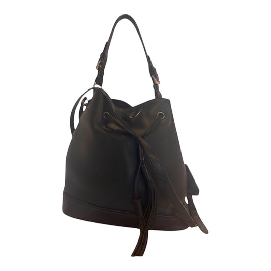 Posh Purse Co. black Prada leather bucket bag with drawstring closure and tassel detail.