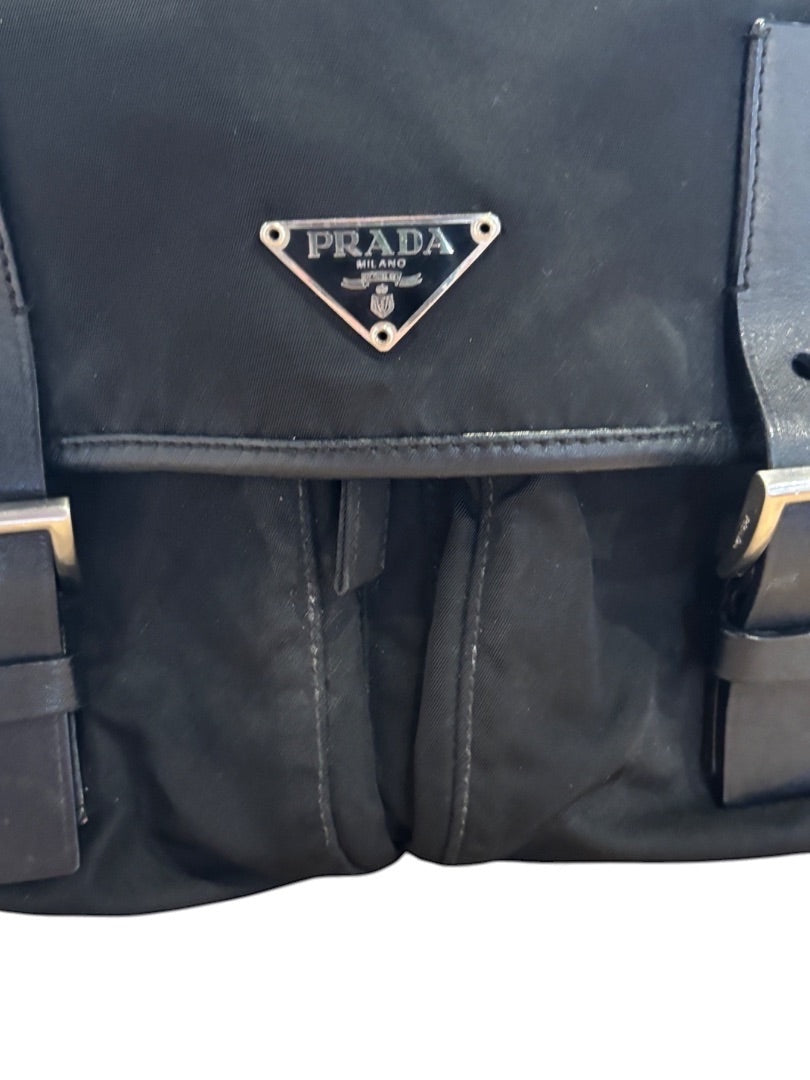 Posh Purse Co. black Prada Vela messenger bag made of nylon with leather trim and silver logo.
