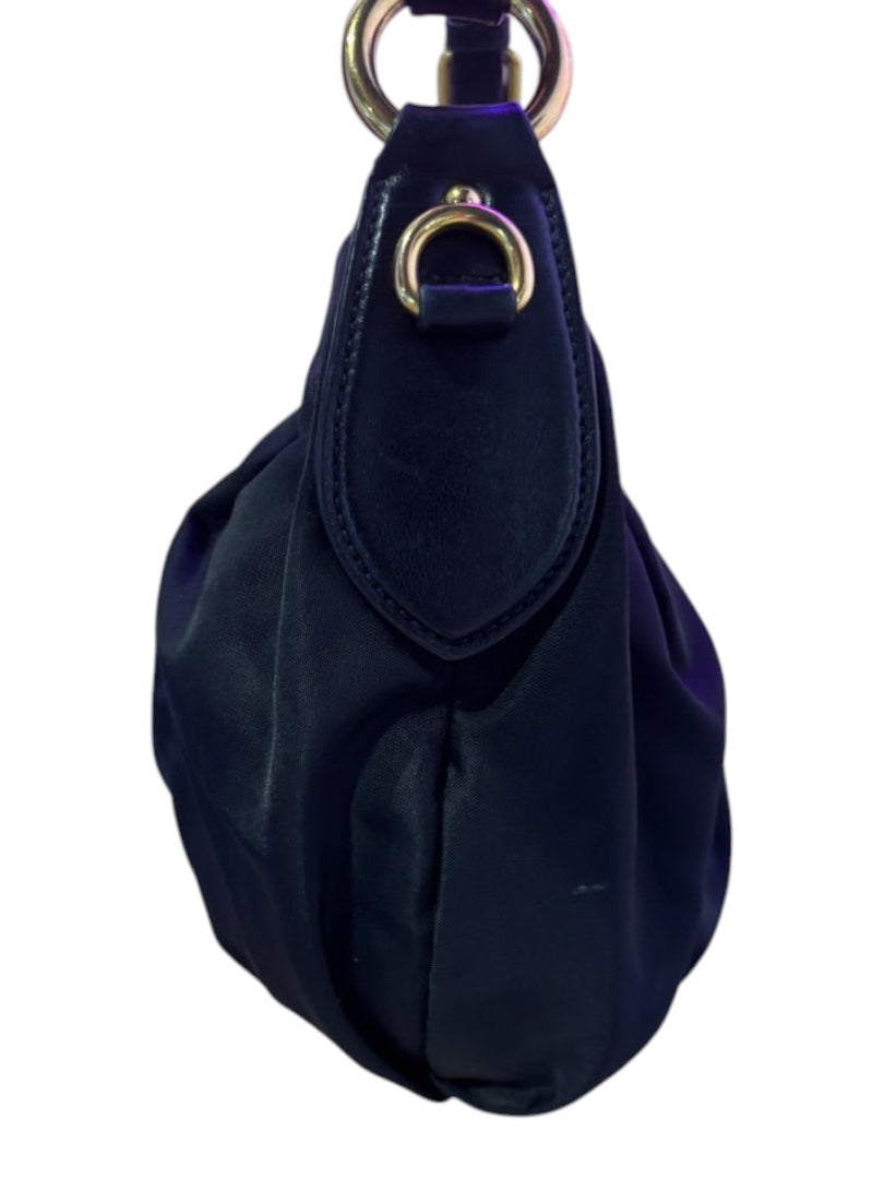 Posh Purse Co. black Prada nylon shoulder bag with gold hardware and leather trim. Iconic, versatile, and durable.