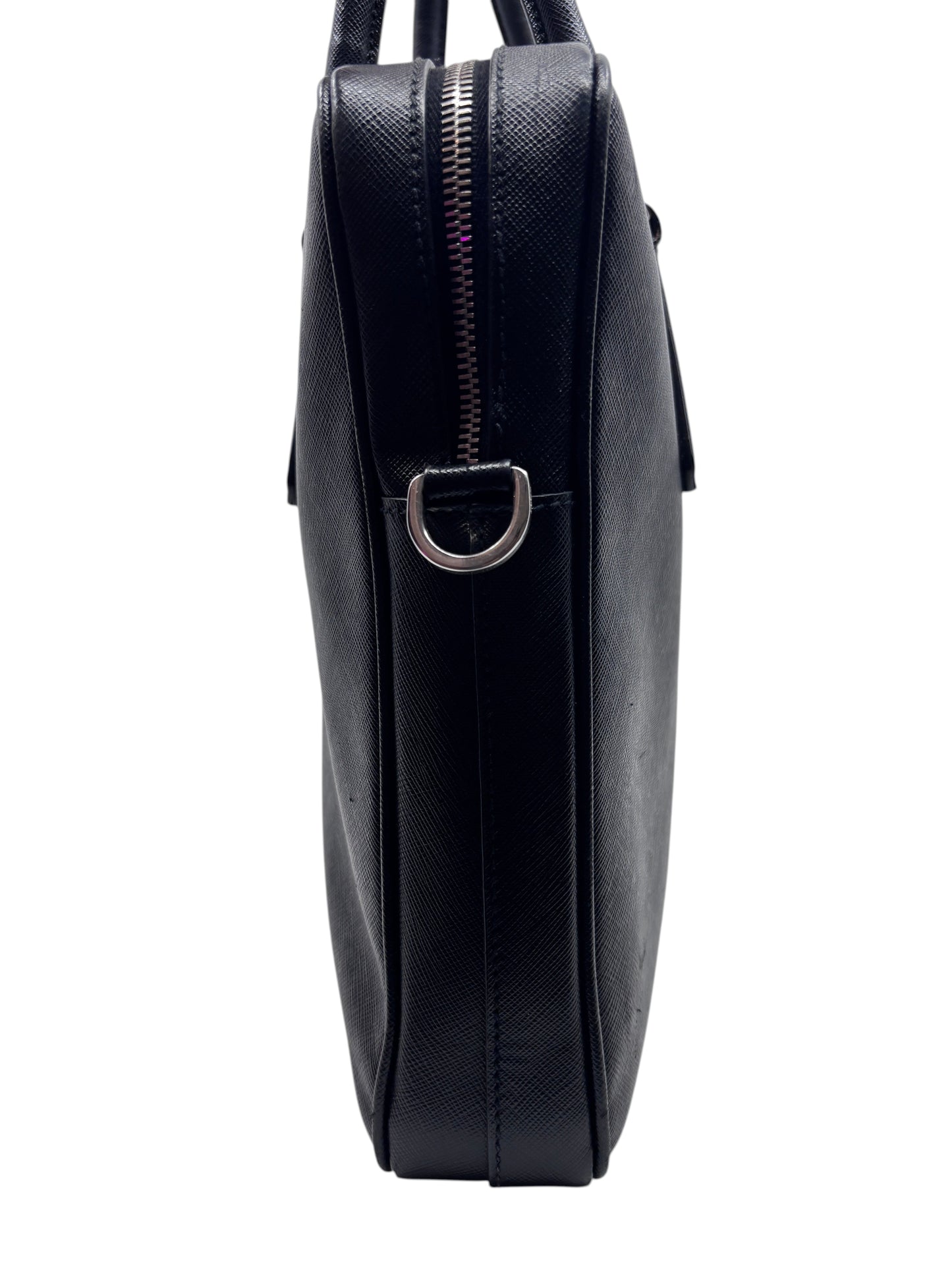 Side view of a black Posh Purse Co Prada Saffiano leather briefcase featuring a silver zipper and D-ring hardware.