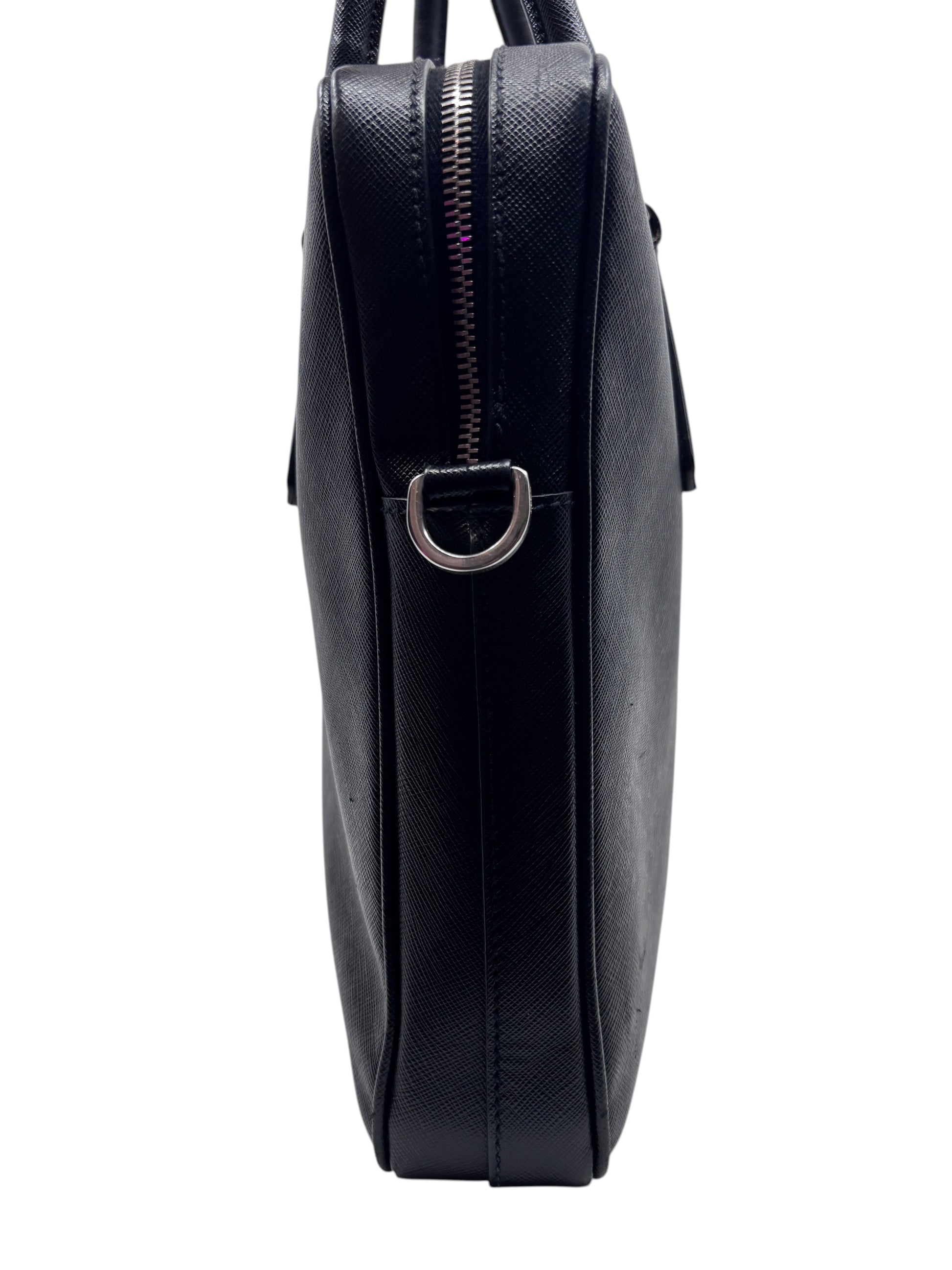 Side view of a black Posh Purse Co Prada Saffiano leather briefcase featuring a silver zipper and D-ring hardware.