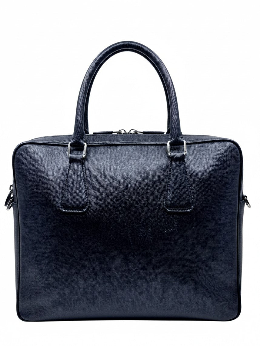 Posh Purse Co black Prada Saffiano leather briefcase with structured silhouette and dual top handles