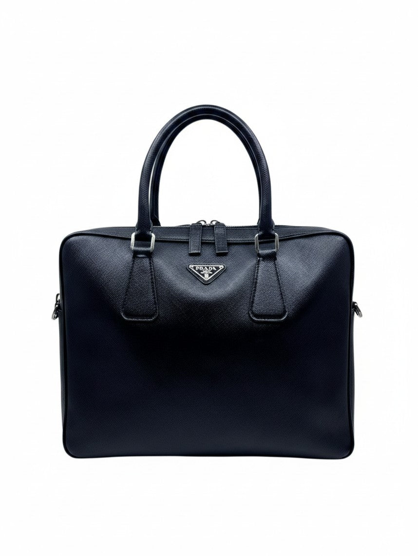 Posh Purse Co black Prada Saffiano leather briefcase with structured silhouette and dual top handles