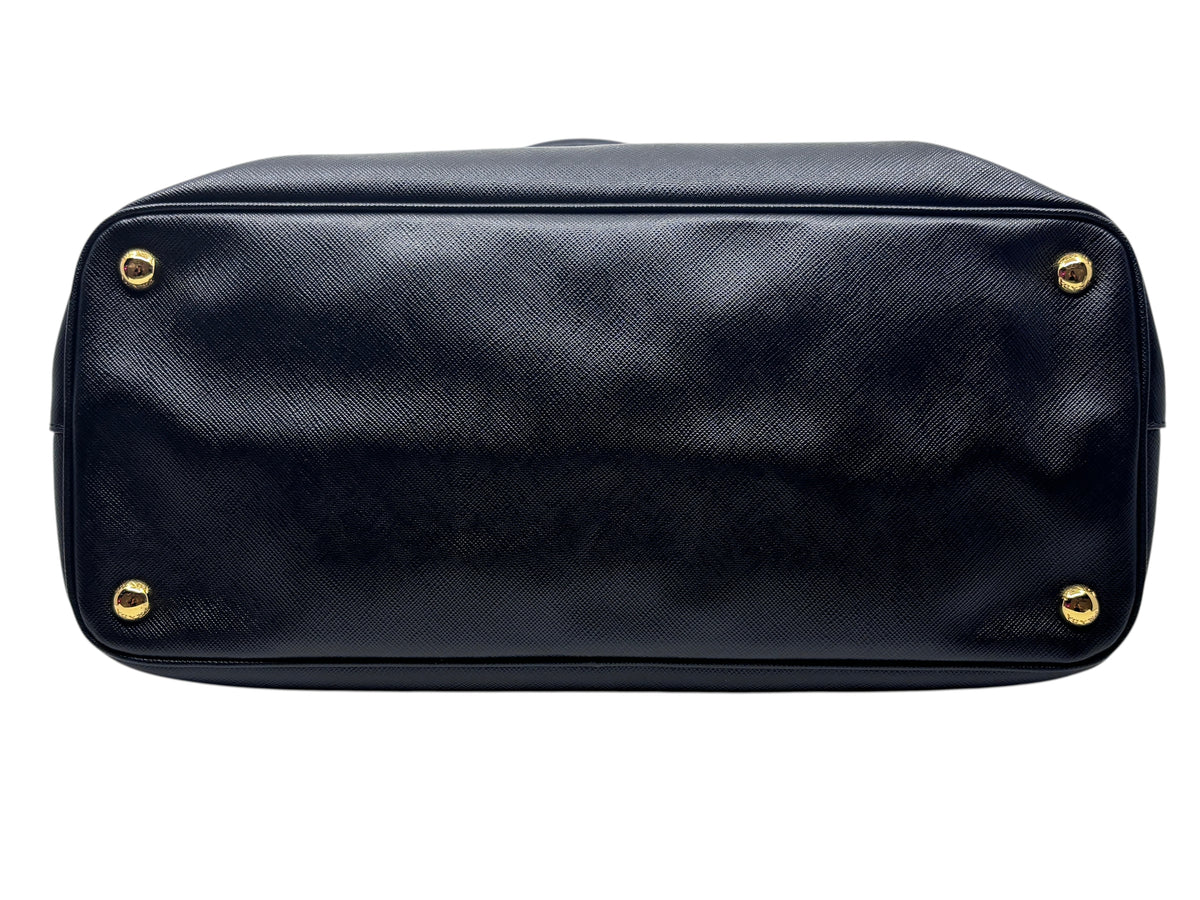 Posh Purse Co black Prada Saffiano leather tote bag base with four protective gold-tone metal feet