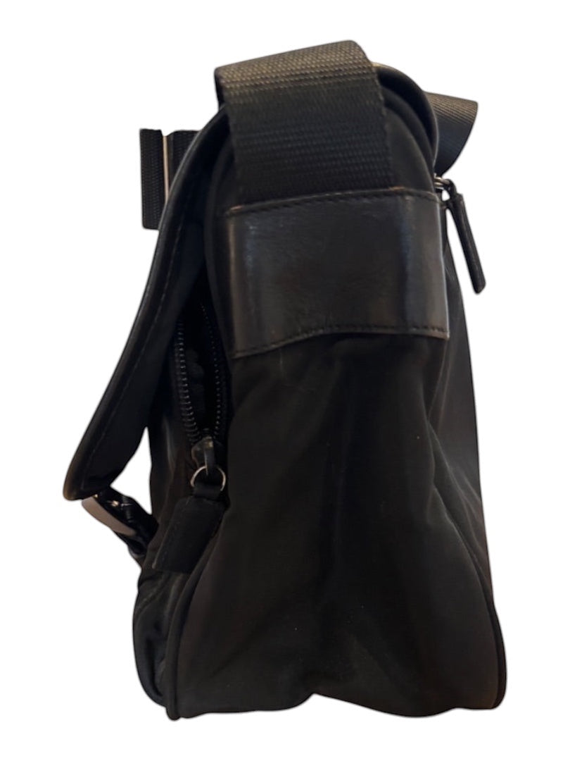 Posh Purse Co. black Prada Vela messenger bag in durable nylon with adjustable strap and zip closure.