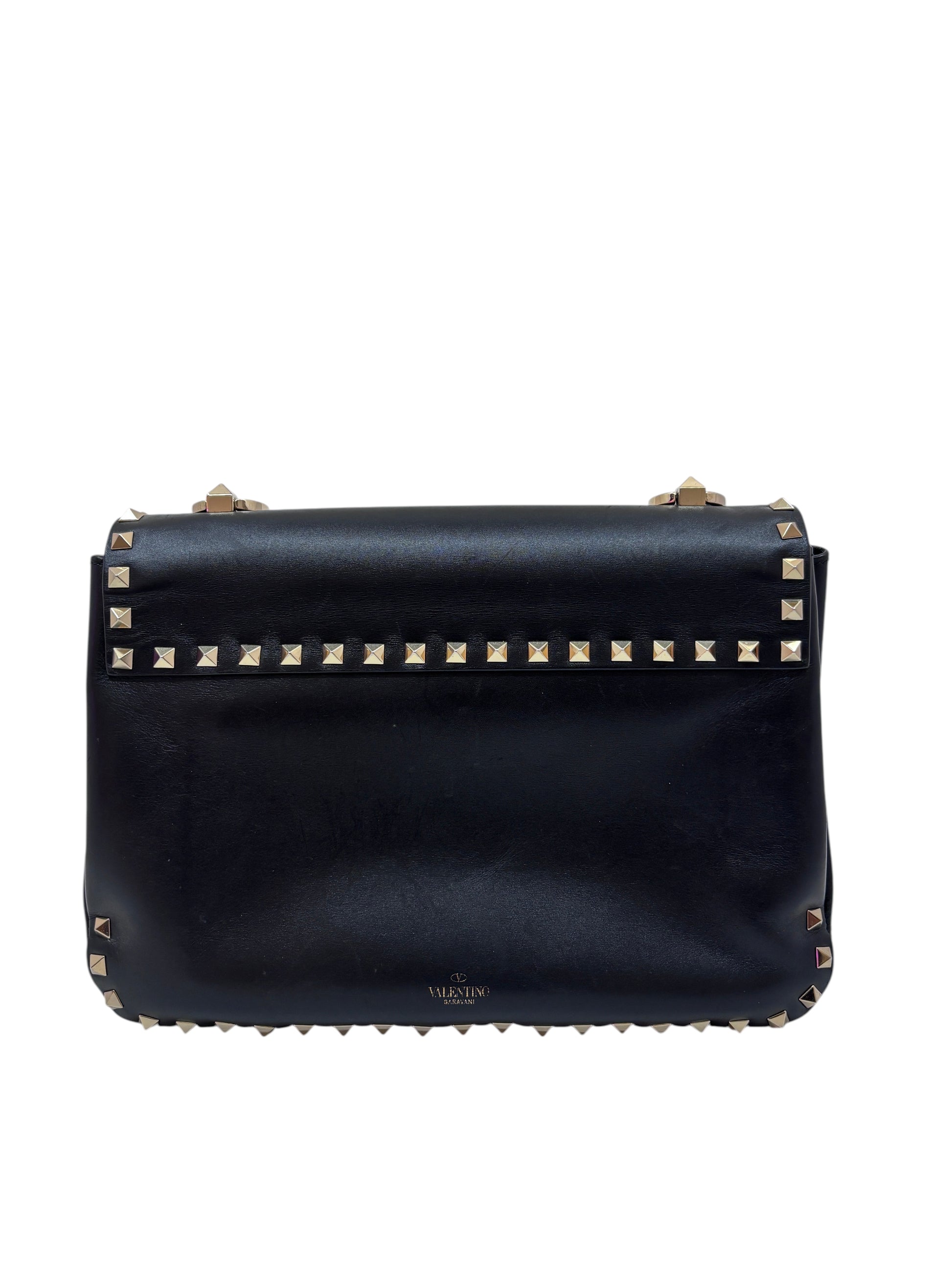 Posh Purse Co. black Valentino Rockstud flap bag with gold-tone pyramid stud detailing and a structured silhouette.