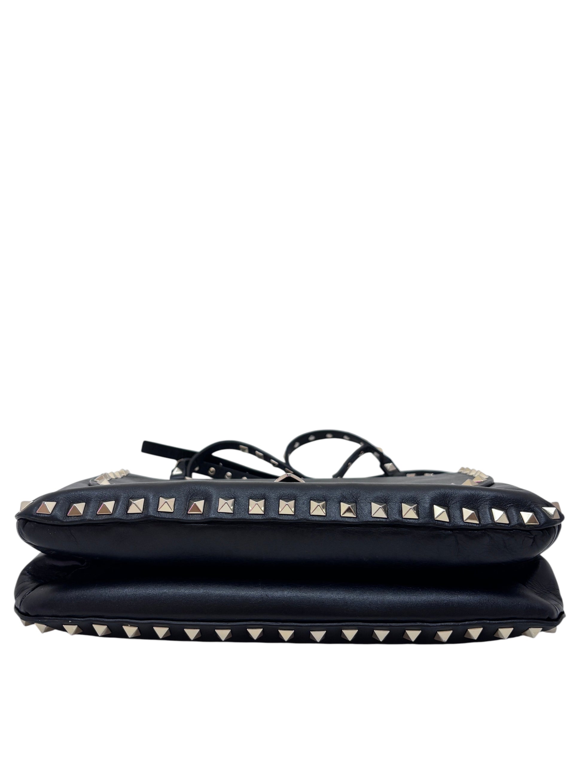 Posh Purse Co. preloved black Valentino Rockstud flap bag featuring signature pyramid stud detailing on a white background