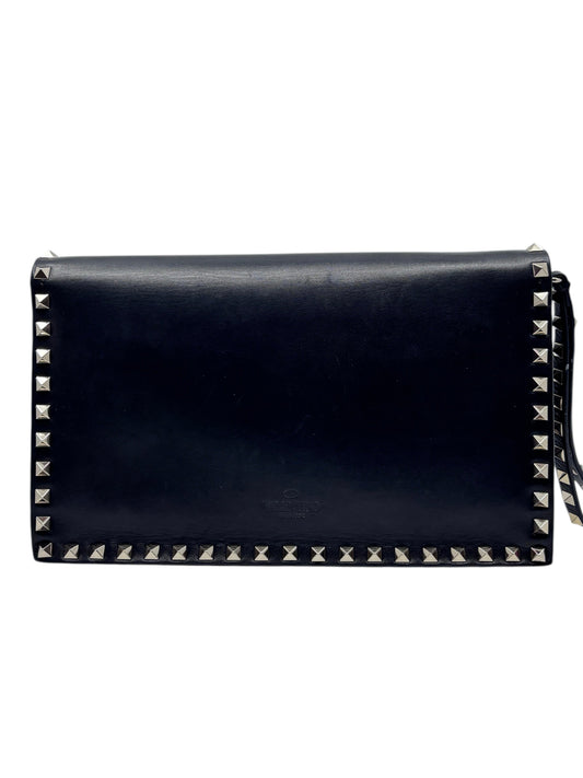 Posh Purse Co. black Valentino Garavani leather wristlet featuring signature silver pyramid Rockstud detailing.