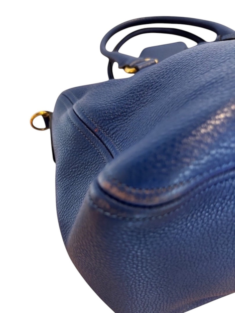 Posh Purse Co. blue Prada Vitello Daino leather handbag with textured finish and dual handles.