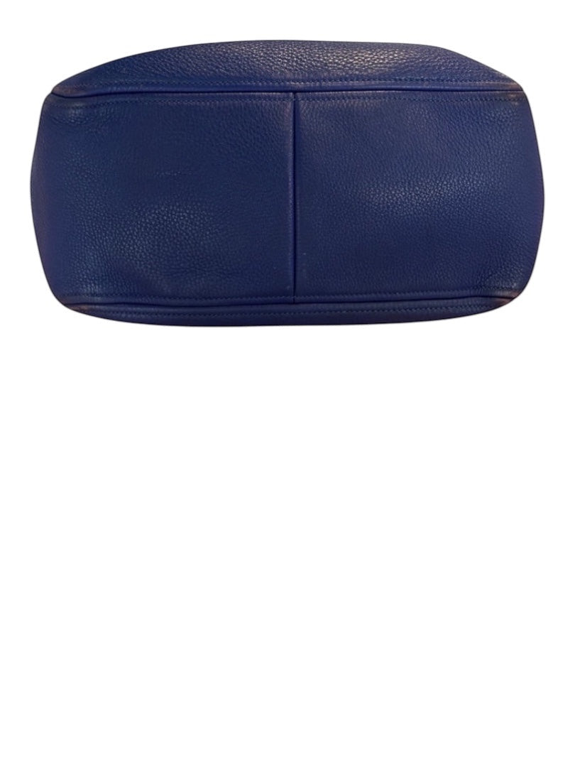 Posh Purse Co. blue Prada Vitello Daino leather handbag with pebbled texture and dual handles.