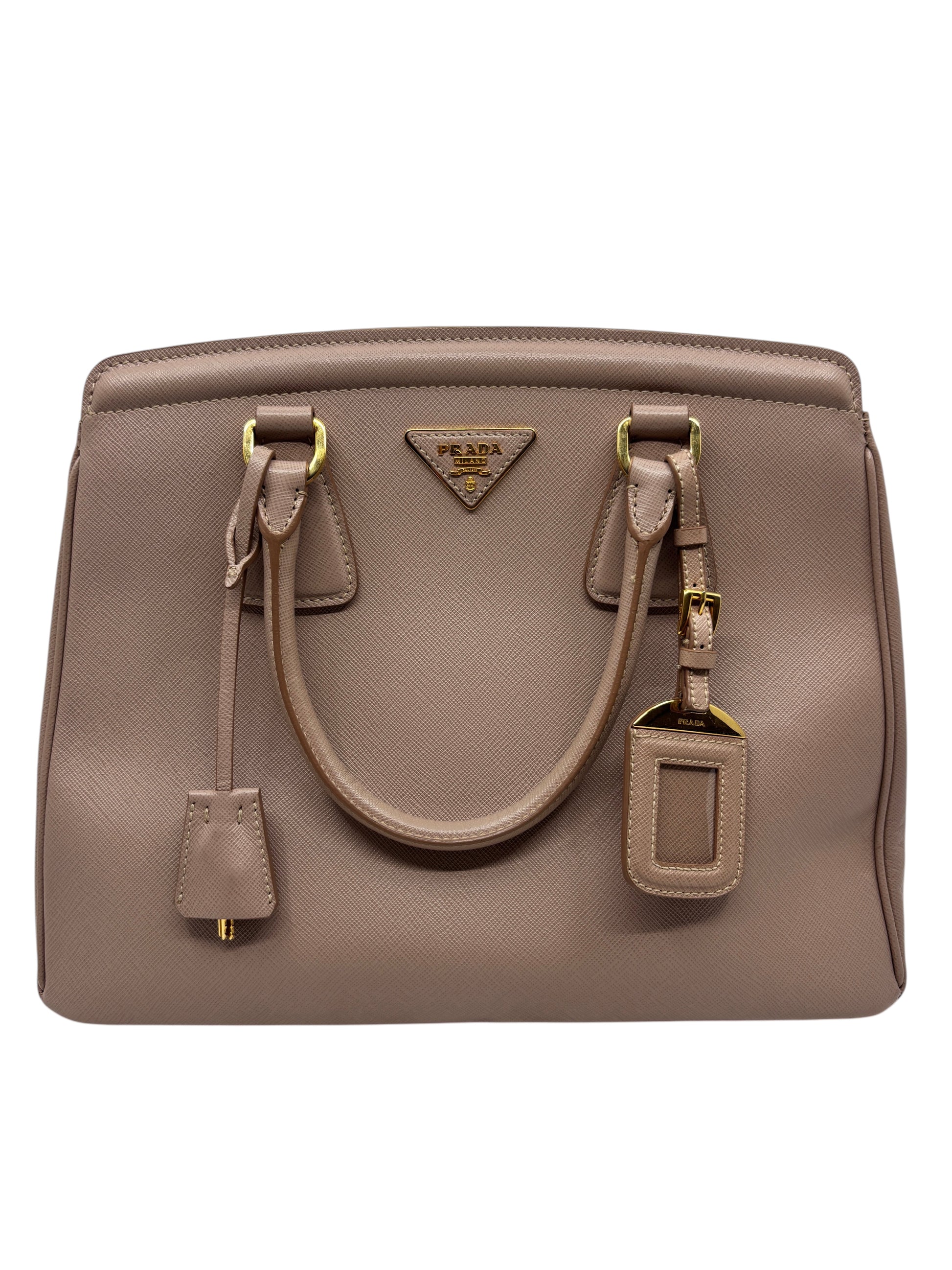 Posh Purse Co. blush beige Prada Saffiano leather tote bag with gold hardware and structured silhouette