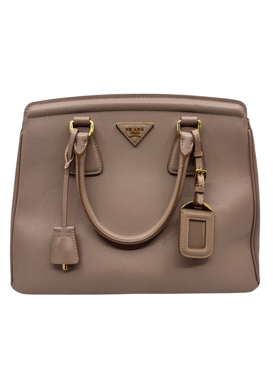 Posh Purse Co. blush beige Prada Saffiano leather tote bag with gold hardware and structured silhouette