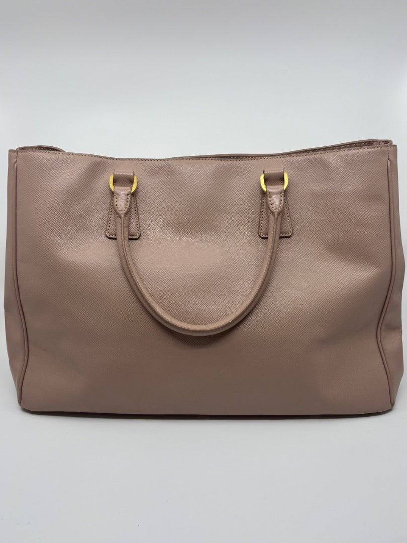 Posh Purse Co. large blush pink Saffiano leather tote bag with gold hardware and double handles.