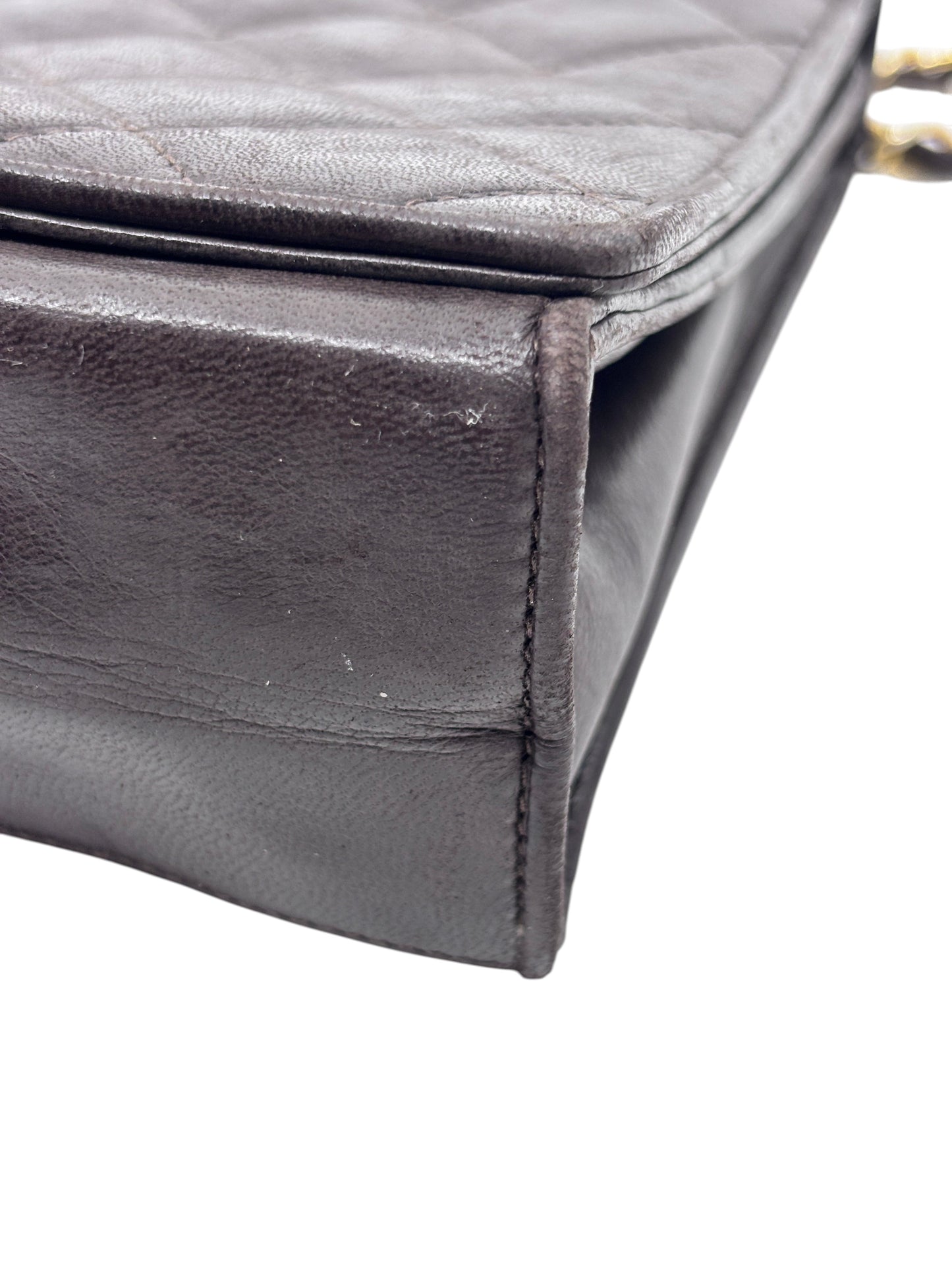 Posh Purse Co preloved brown Chanel quilted Timeless Flap bag showing exterior leather wear and corner detail