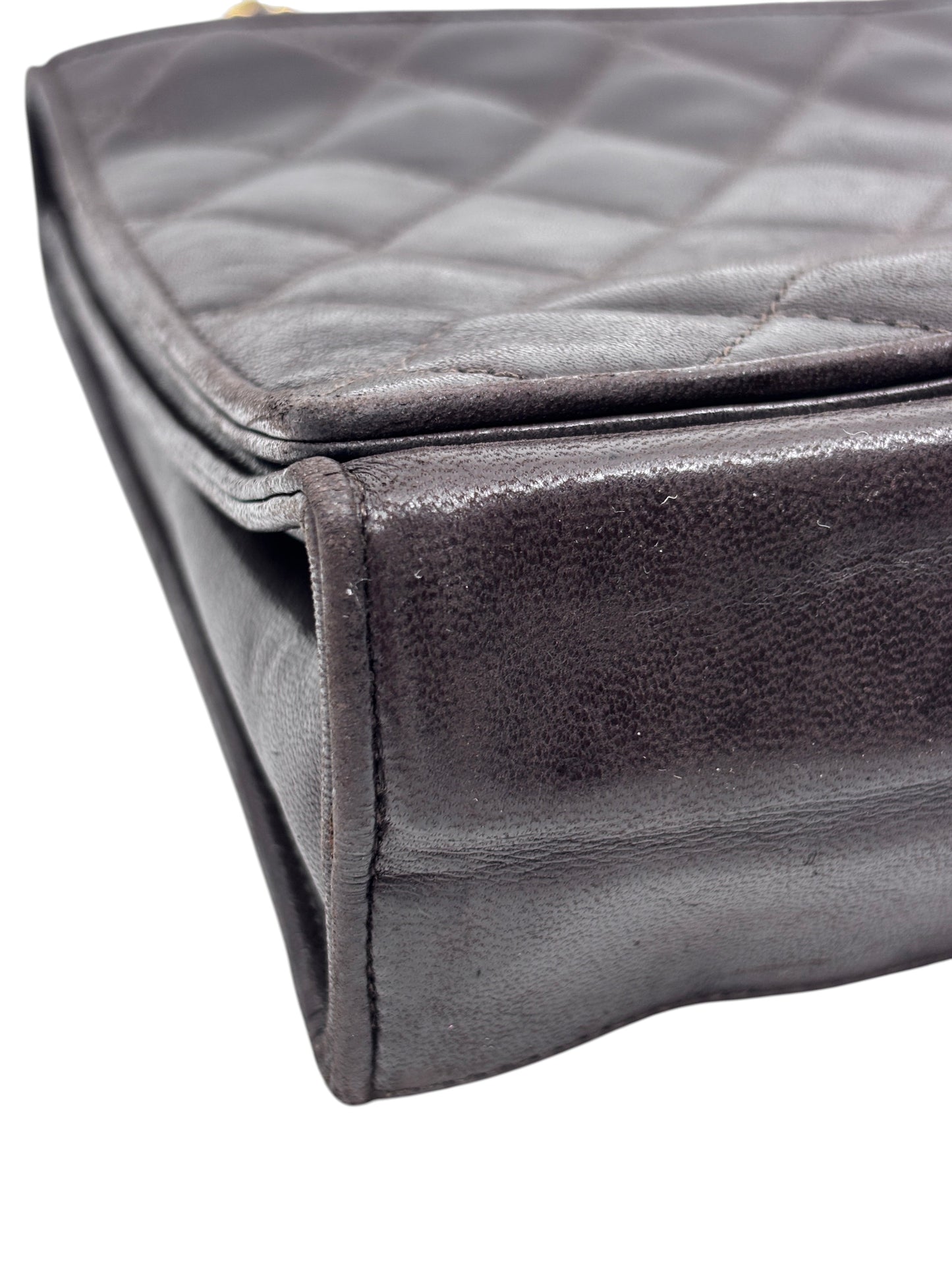 Posh Purse Co brown quilted Chanel Timeless Flap bag showing leather texture and side profile detail