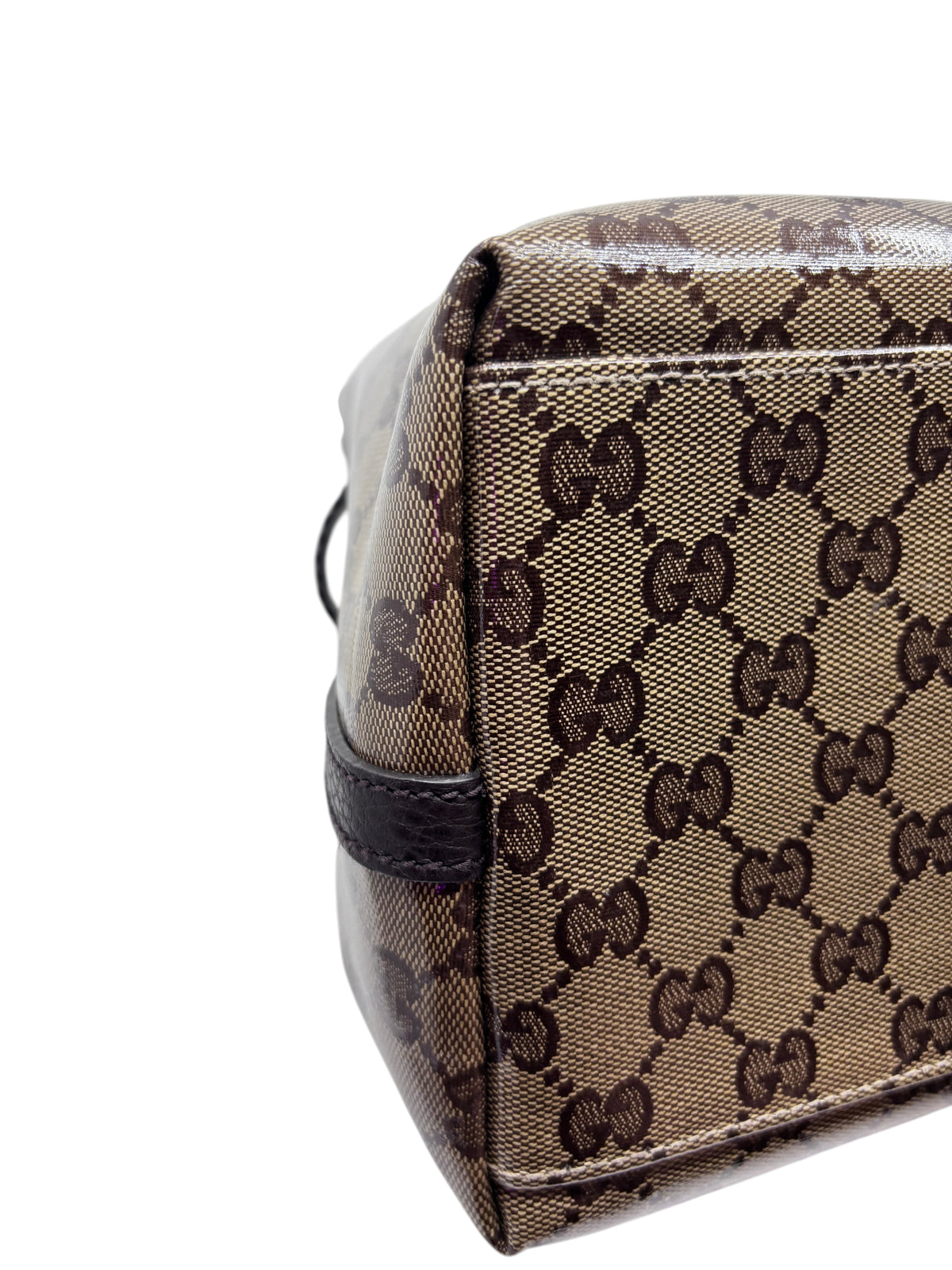 Close-up of the brown GG monogram canvas on a vintage Posh Purse Co. Gucci Gifford tote bag with leather trim.