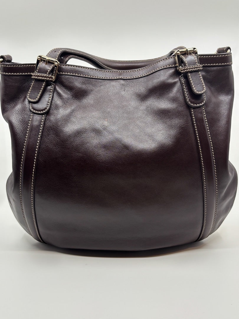 Posh Purse Co. brown leather tote bag with white stitching and gold buckle details. Iconic GG logo.