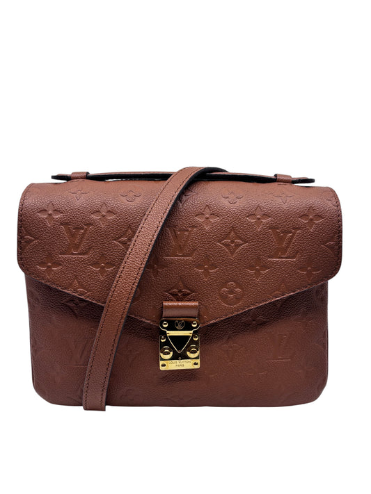 Posh Purse Co. brown Louis Vuitton Pochette Metis handbag in embossed monogram leather with gold-tone S-lock closure.