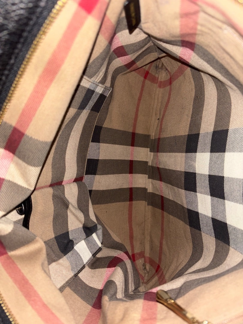 Posh Purse Co. Burberry black leather tote bag interior with iconic nova check lining and gold hardware.
