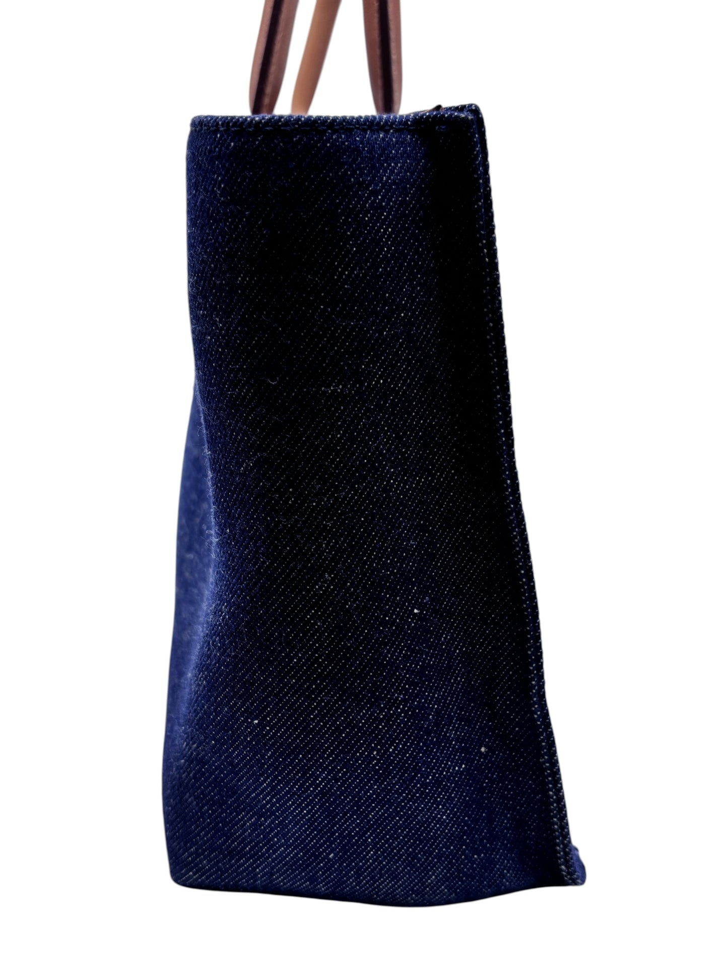 Posh Purse Co Burberry Nova Check denim tote bag side view showing dark blue fabric and leather handles