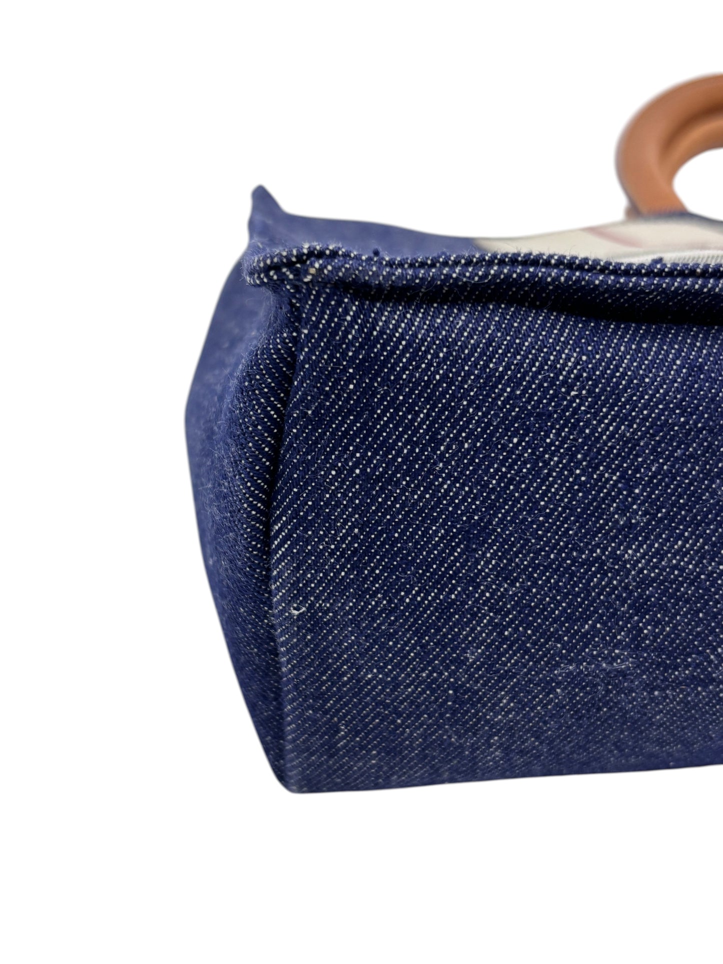 Posh Purse Co Burberry Nova Check denim tote bag side view showing blue denim texture and brown leather handle