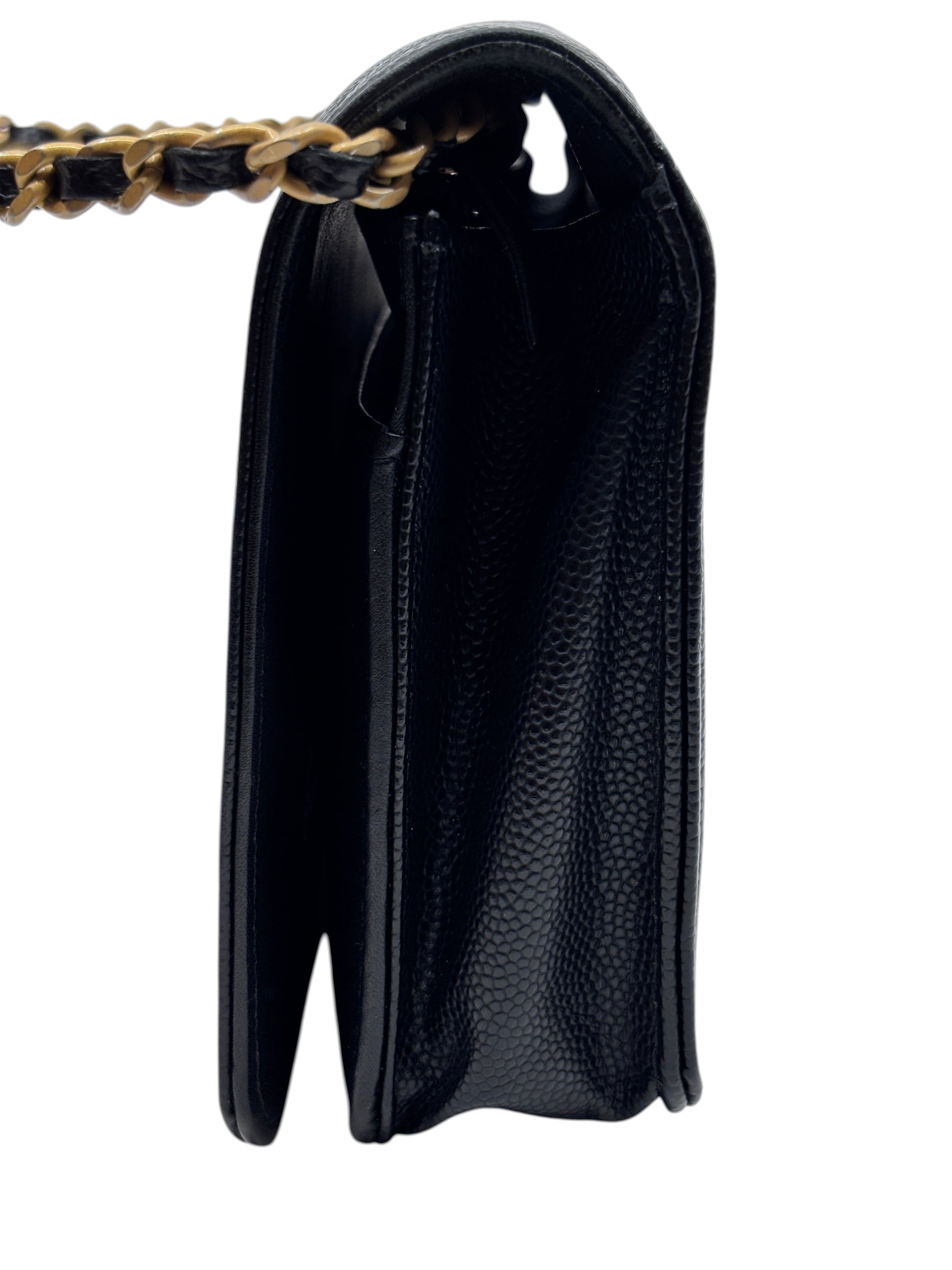 Side view of a black Posh Purse Co Chanel Boy Wallet on Chain featuring textured leather and gold chain strap