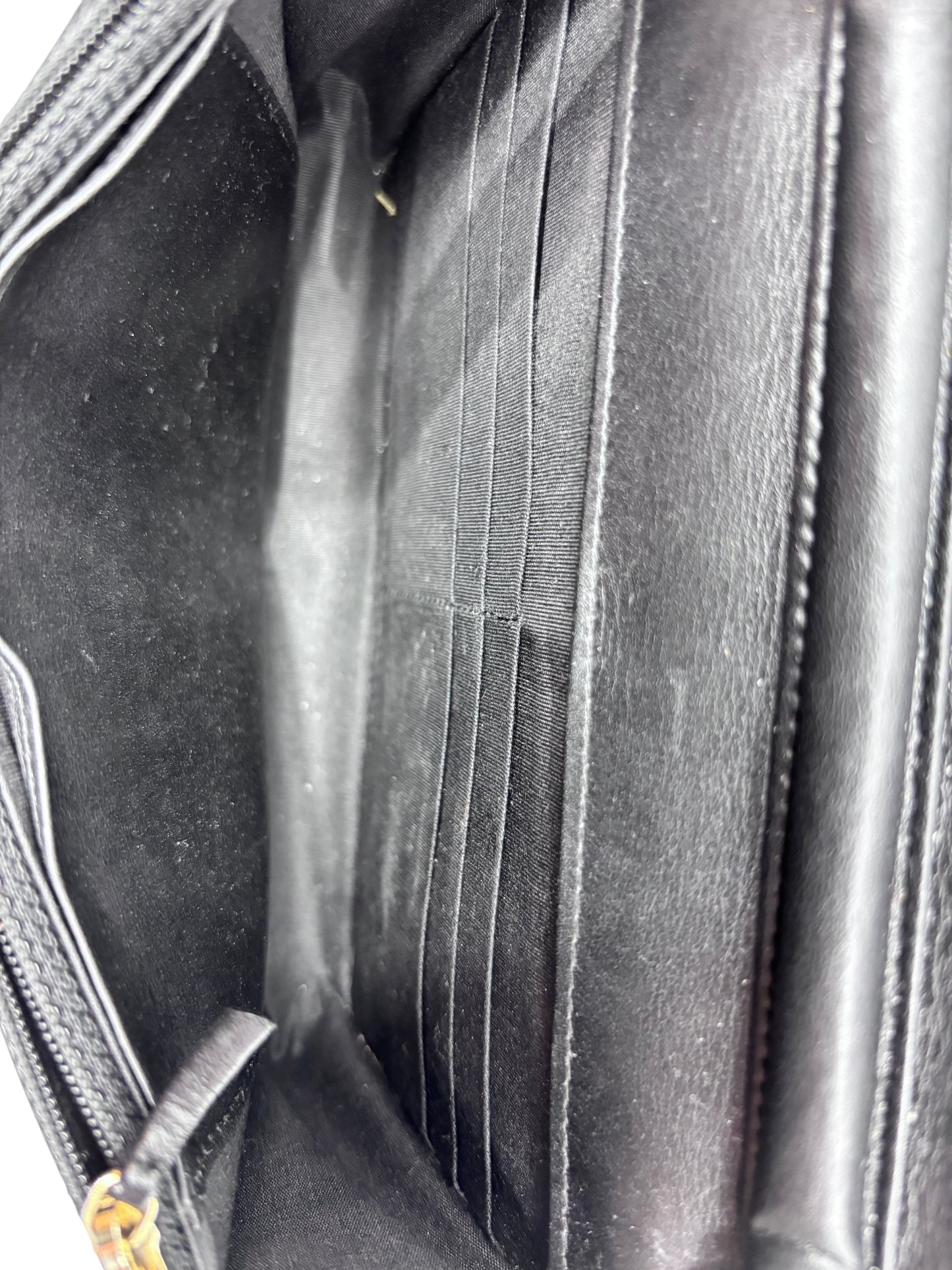 Interior of Posh Purse Co preloved black Chanel Boy Wallet on Chain showing card slots and fabric lining
