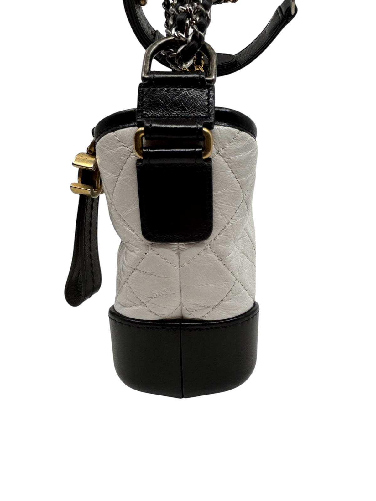 Posh Purse Co Chanel Gabrielle crossbody bag in white and black quilted leather with mixed-metal chain strap side view