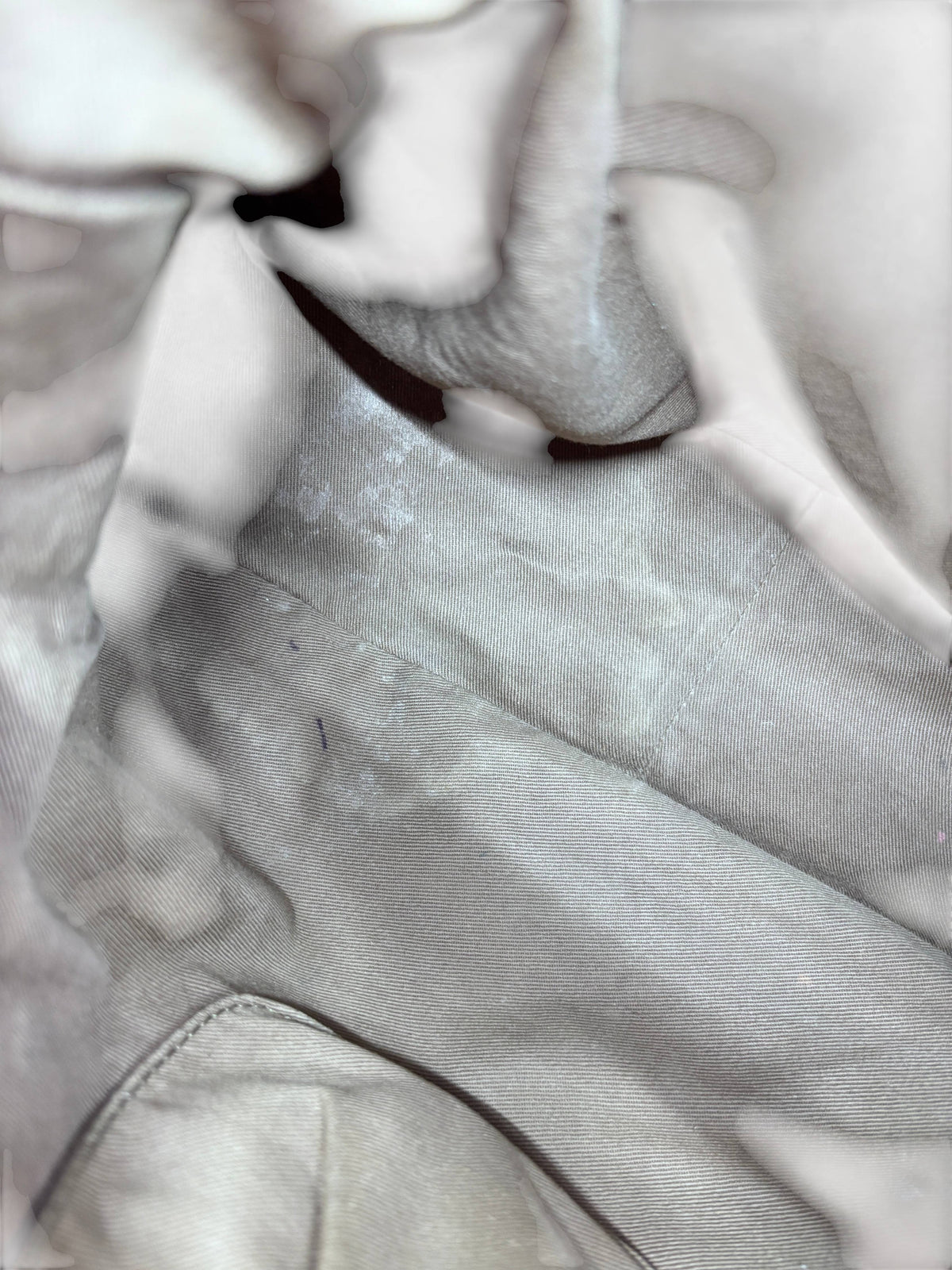 Interior lining of the Posh Purse Co. preowned Chloe Marcie medium satchel showing light fabric with minor stains