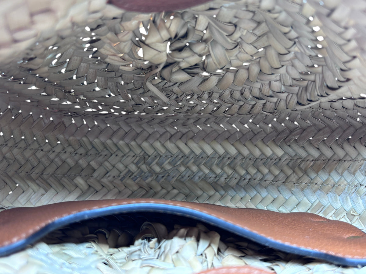 Interior view of the Posh Purse Co Chloé Marcie small raffia satchel bag showing woven texture and leather trim
