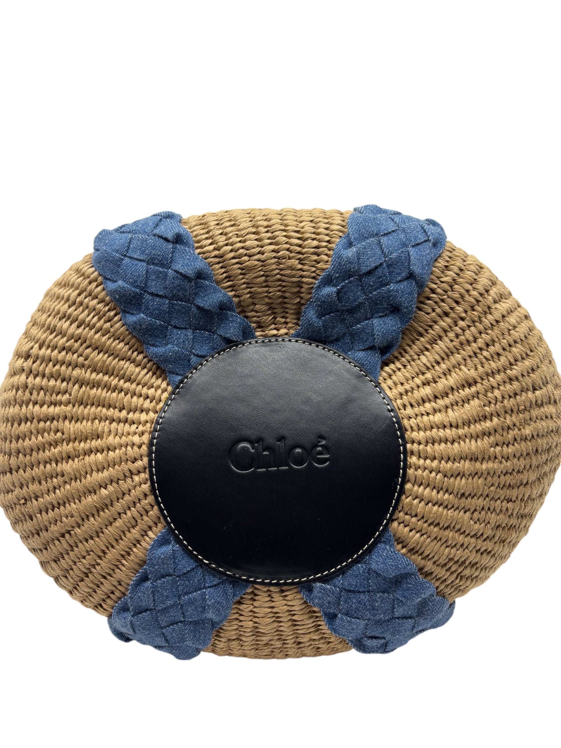 Posh Purse Co. Chloé Woody basket bag featuring a natural woven straw base with blue braided denim and black leather logo